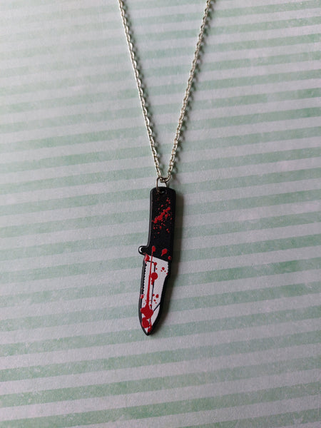 bloody combat knife necklace