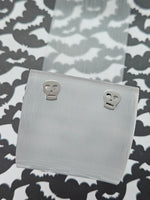 silver skull stud earrings