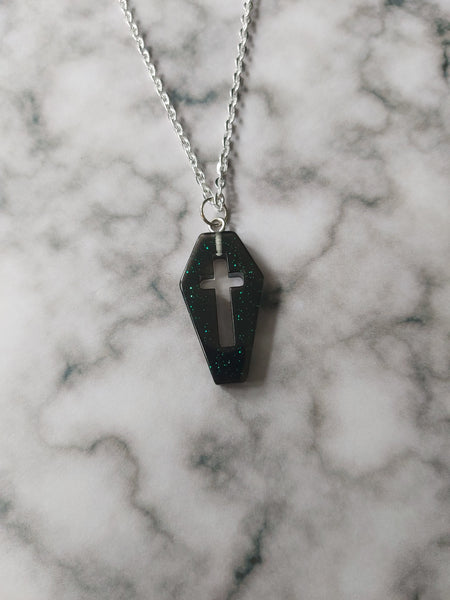 glitter cross coffin necklace - black (green glitter)