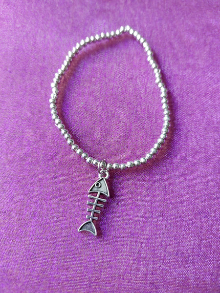 beaded skeleton fish charm bracelet 