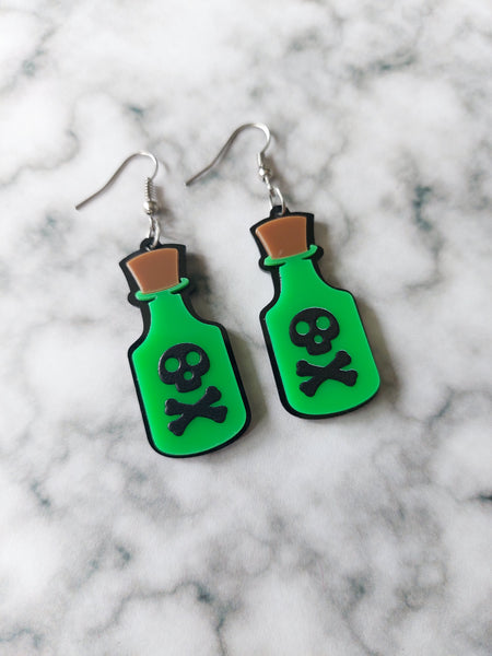 green skull poison bottle earrings 